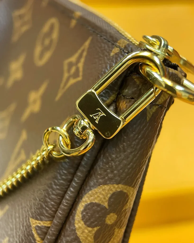 Brown Monogram Mini Chain Zip Pouch — clasp detail view