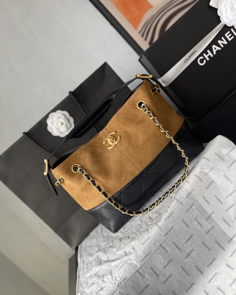 Tan and Black Quilted Chain Tote — angled front view