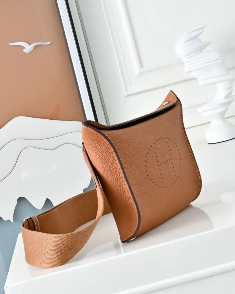 Videpoches-Inspired Tan Structured Crossbody Pouch, angled front and side gusset