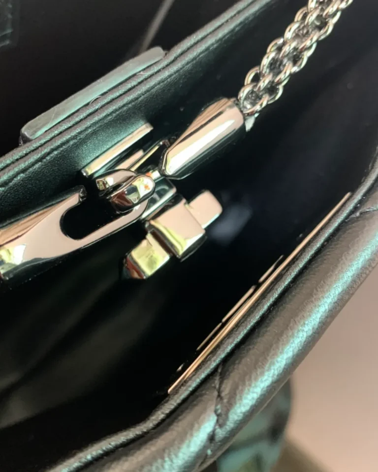 Black Diamond-Quilted Studded Top-Handle Bag — interior closure view