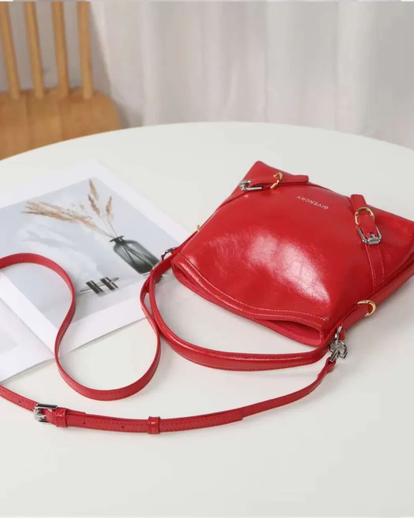 Glossy Red Buckle Shoulder Bag — top with strap