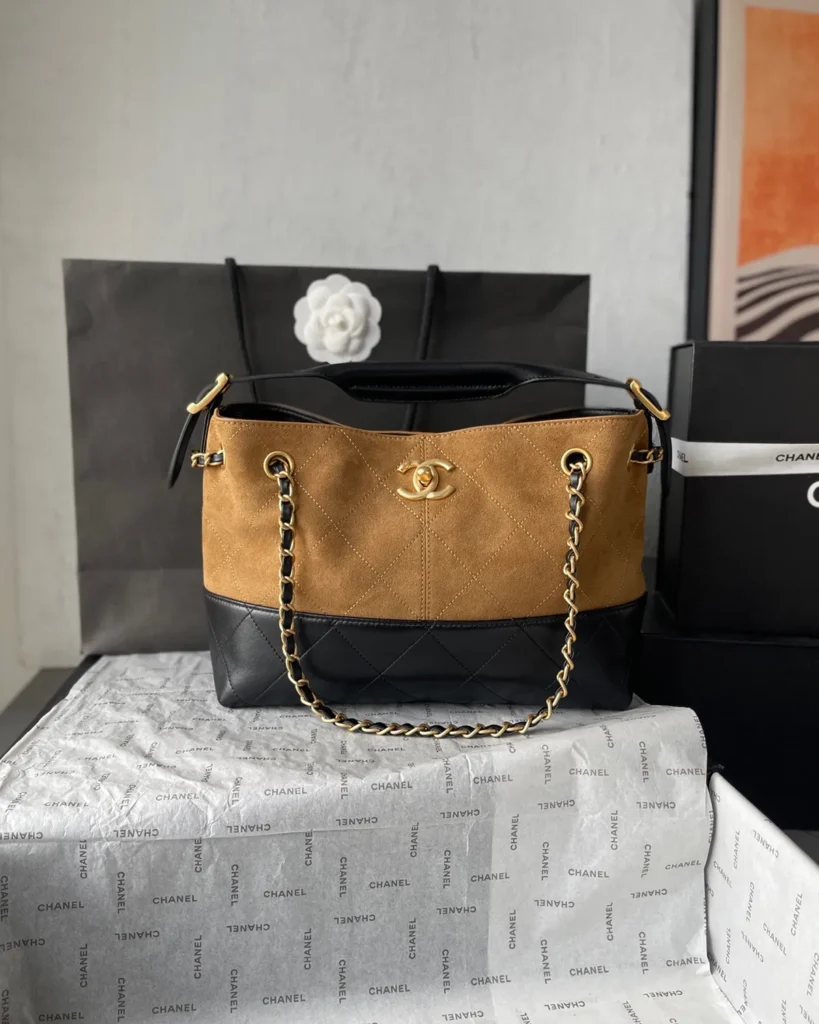 Tan and Black Quilted Chain Tote — front view