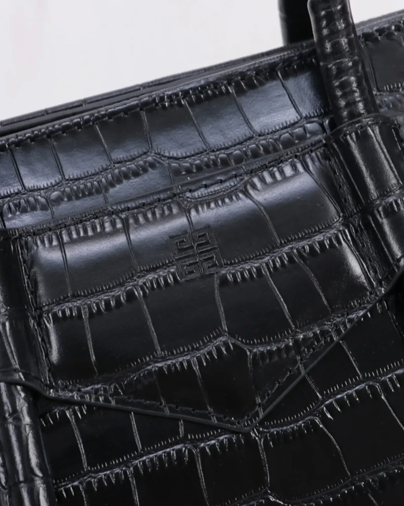 Black Scale-Texture Padlock Satchel — texture detail