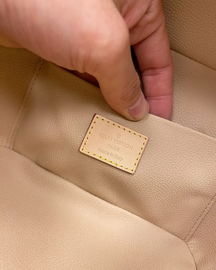 Brown Monogram Top Handle Vanity Case — interior label view