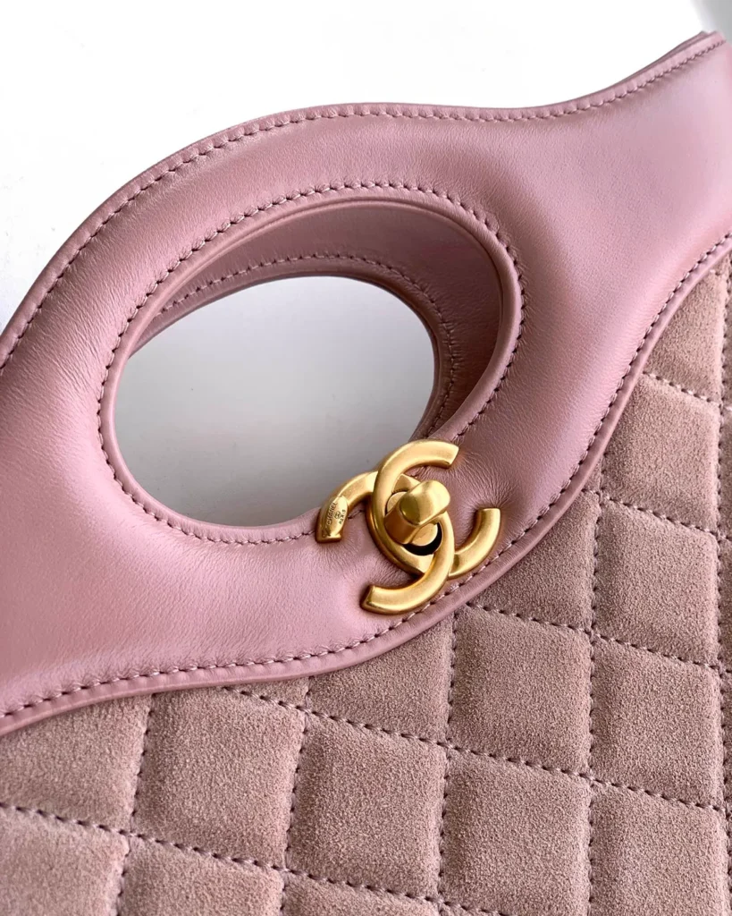 Pink Quilted Cutout-Handle Tote — handle detail view