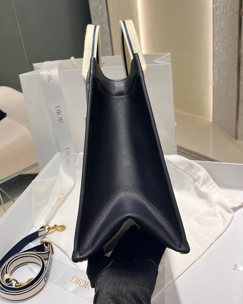 Navy and Cream Wildlife Tote — angled side view