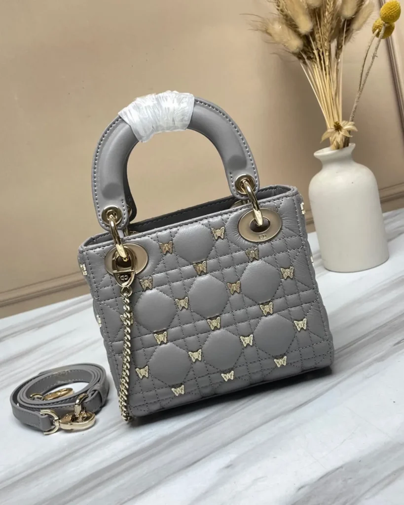 Gray Butterfly Stud Quilted Top Handle Bag — rear view