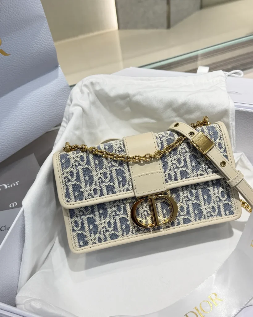 Blue and Cream Patterned Flap Bag — front view