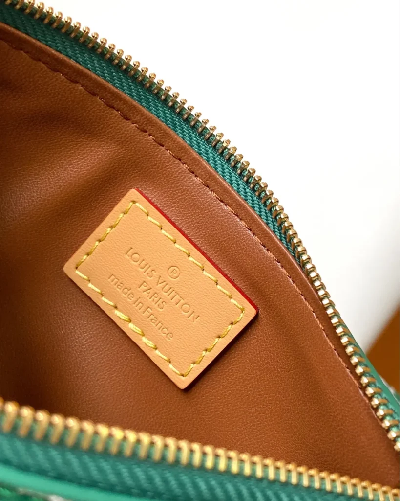 Green and White Monogram Duffle Bag — interior label view