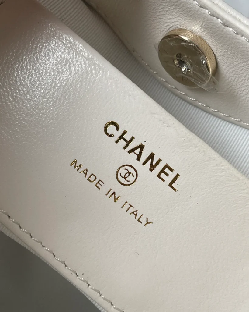 Ivory Quilted Cutout-Handle Tote — lining detail view