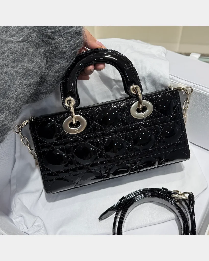 Glossy Black Horizontal Quilted Handbag — rear view