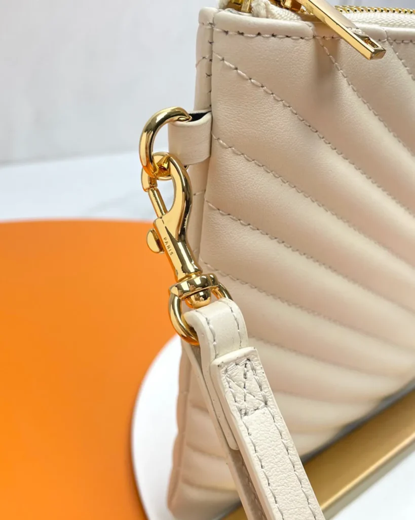 Ivory Chevron Zip Wristlet Pouch — strap detail view