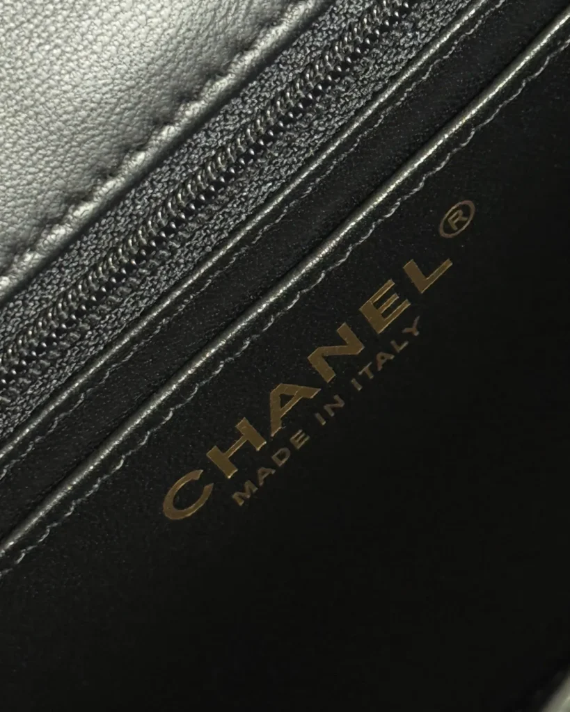 Black Bow-Detail Quilted Top-Handle Bag — interior label view