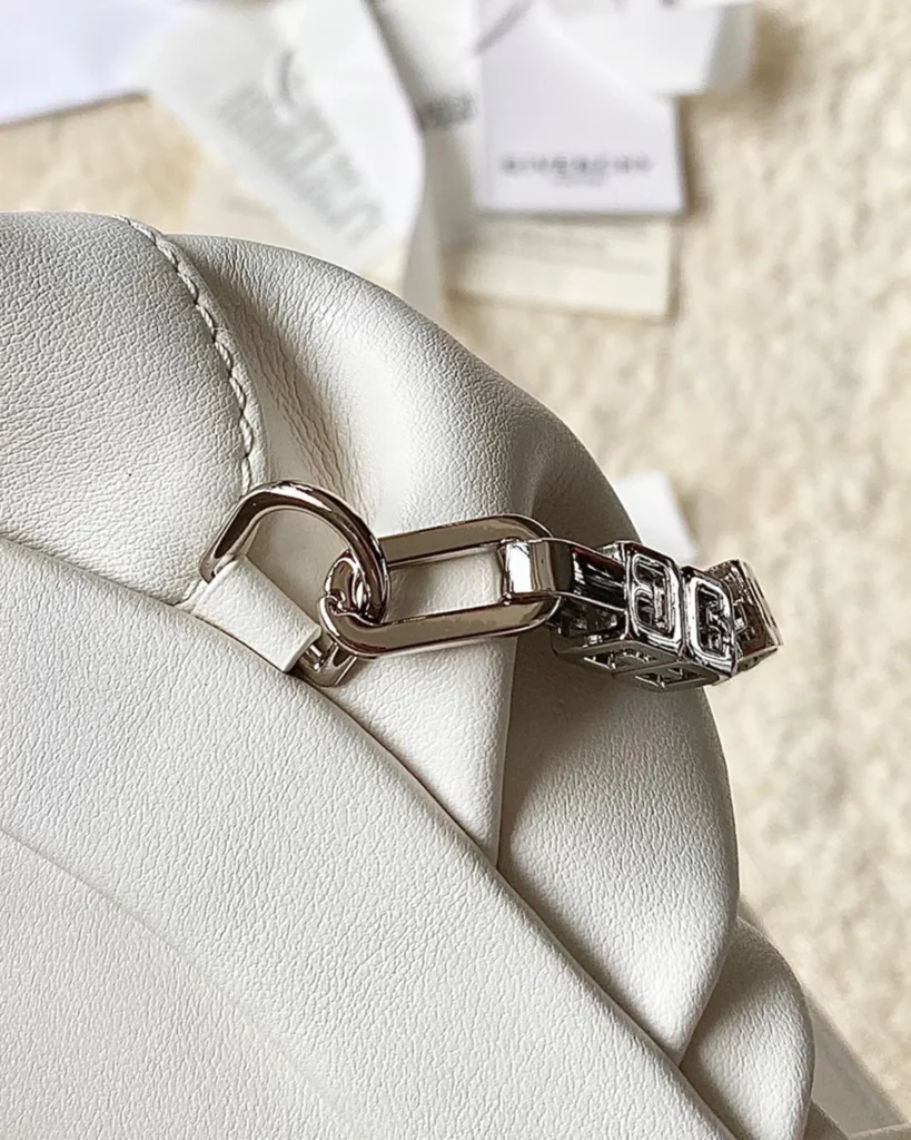 Ivory Ruched Chain Pouch — clip detail
