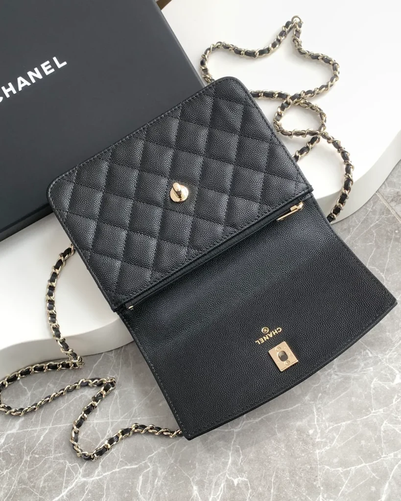Black Quilted Top-Handle Chain Clutch — open flap view