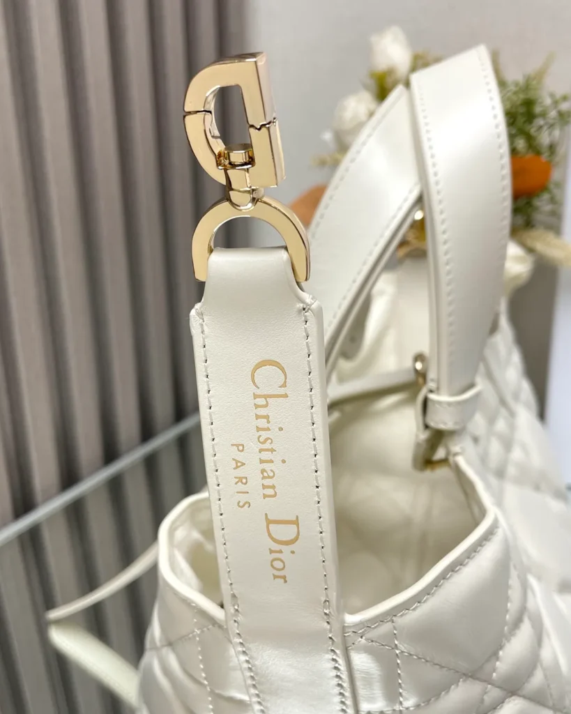 Ivory Soft Quilted Tote — strap clip view