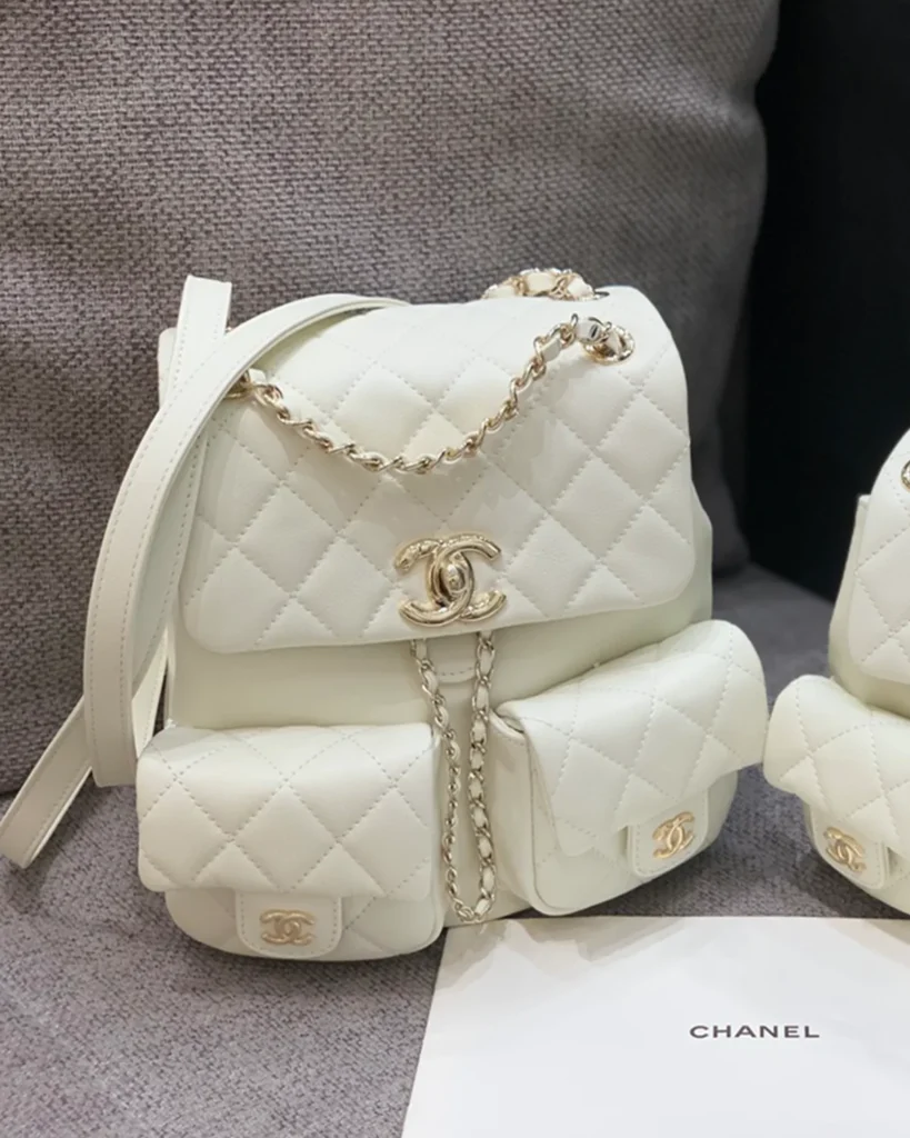 Ivory Quilted Twin-Pocket Backpack — alternate front view