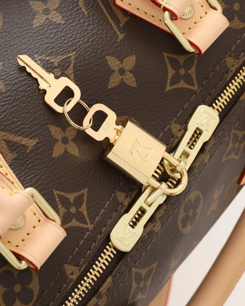Brown Monogram Speedy-Inspired Boston Bag — zipper padlock detail view