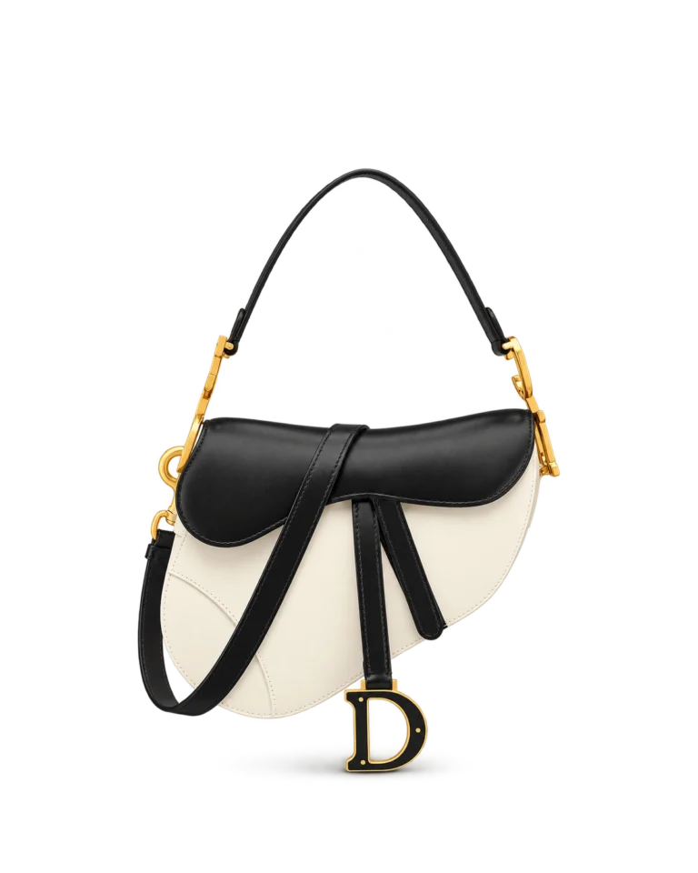 Cream and Black Asymmetric Saddle Bag — upright front view
