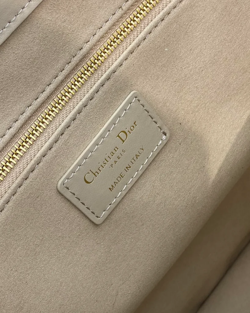Taupe Geometric Quilted Tote — interior label view