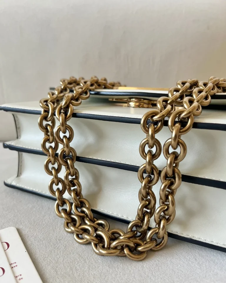 Ivory Curved-Flap Chain Shoulder Bag — top view