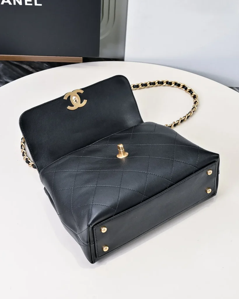 Black Quilted Top-Handle Flap Bag — open base view