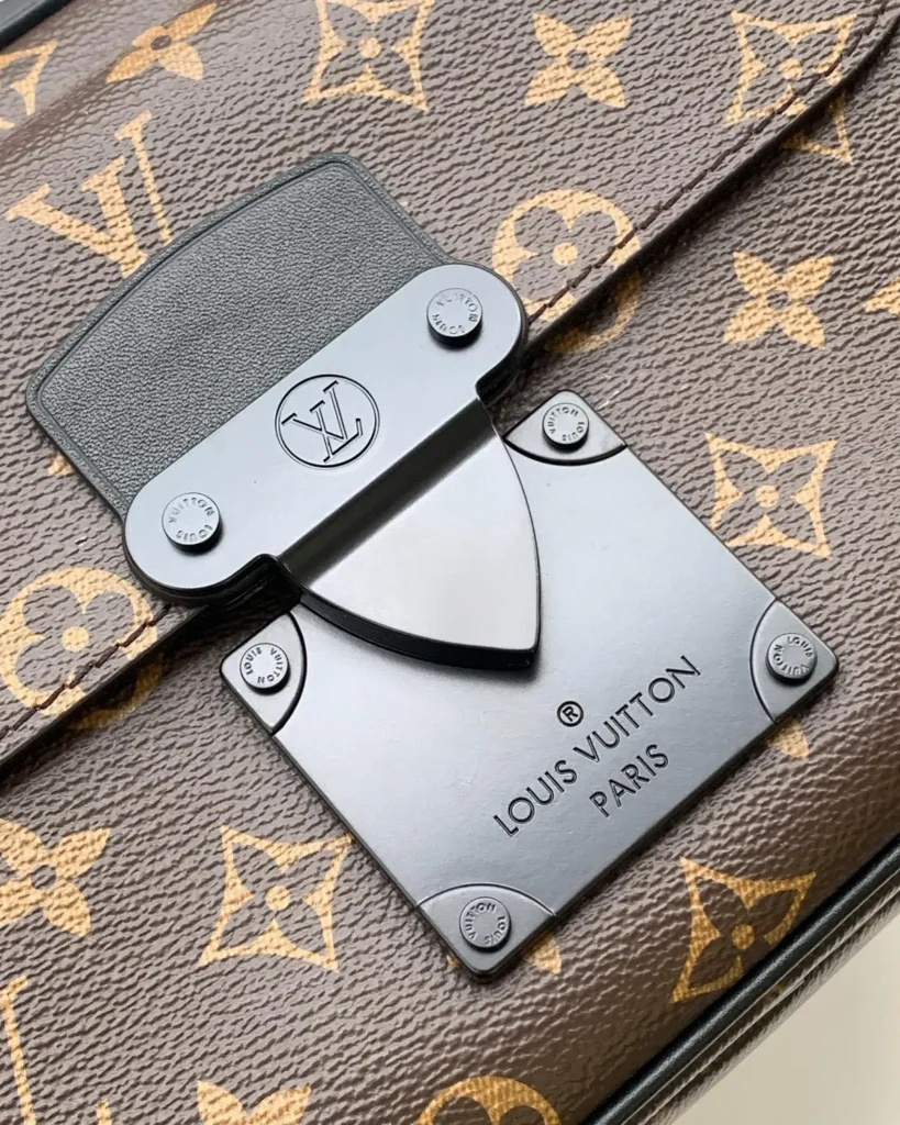 Brown Monogram Black-Trim Messenger Bag — clasp detail view