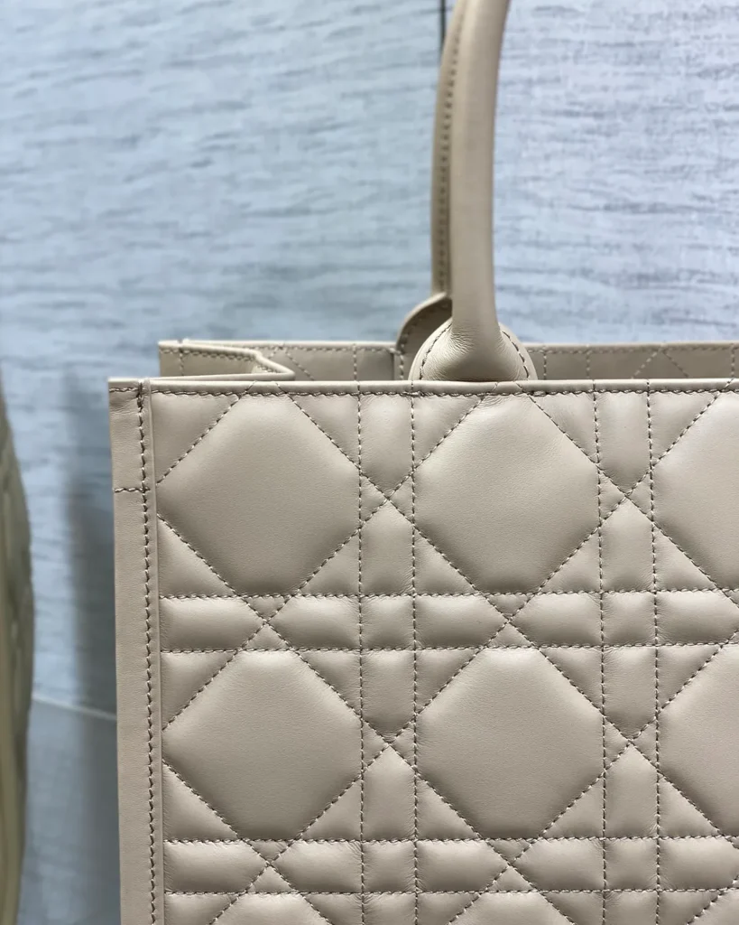 Taupe Geometric Quilted Tote — handle detail view