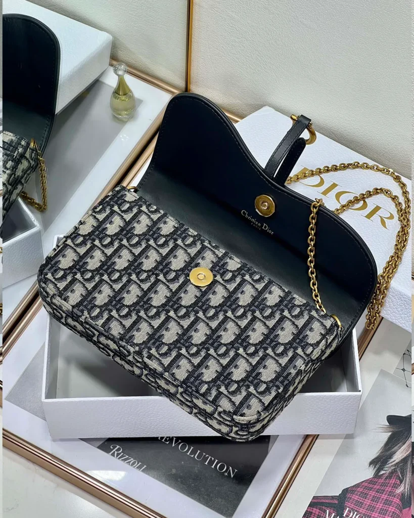 Navy Monogram Asymmetric Chain Pouch — open flap view