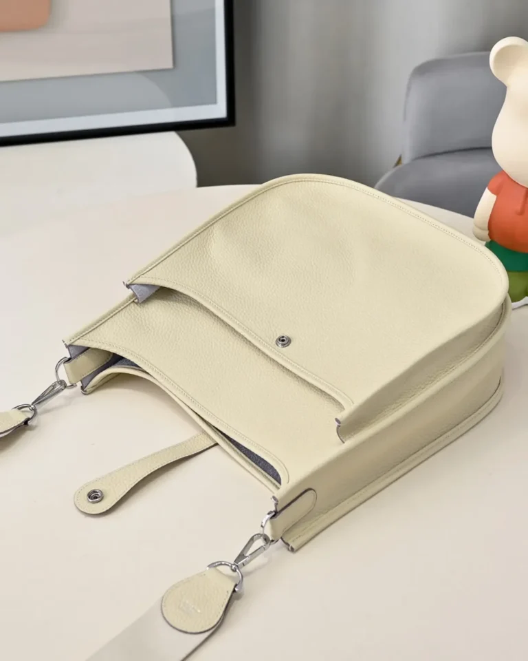 Evelyne-Inspired Ivory Perforated Shoulder Bag, rear laid flat