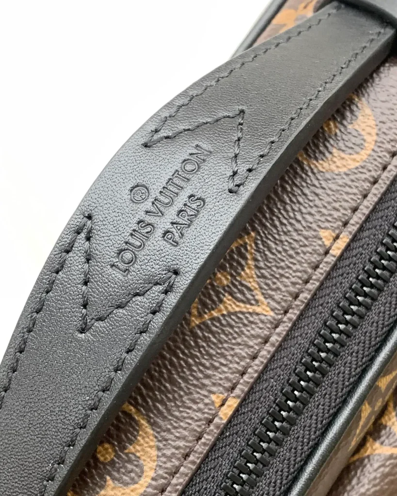 Brown Monogram Black-Trim Messenger Bag — handle detail view