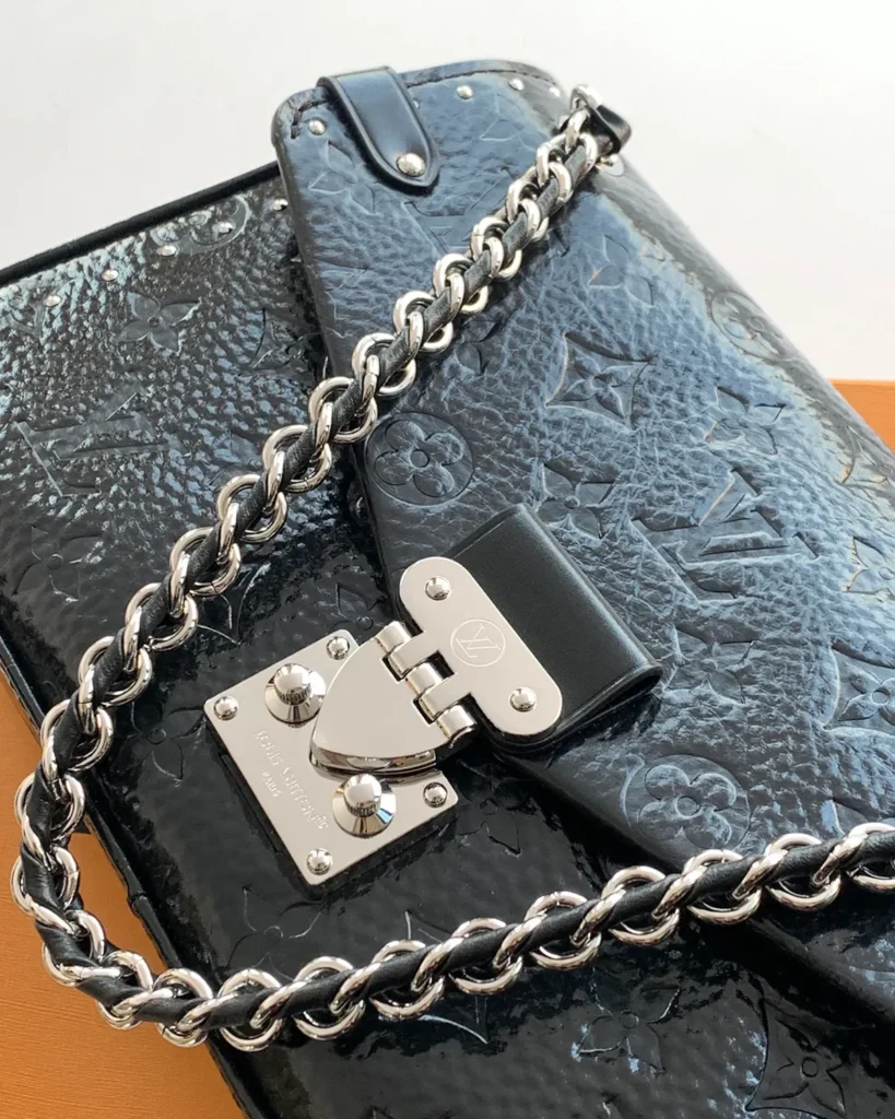 Black Embossed Chain Flap Bag — clasp view