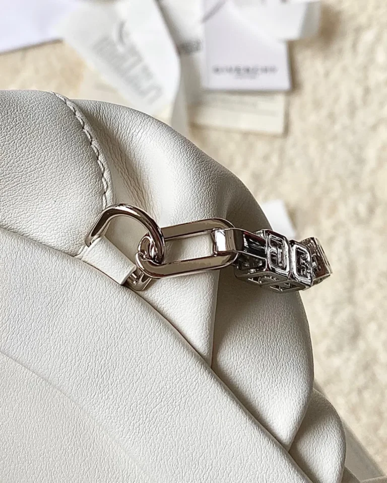 Ivory Ruched Chain Pouch — clip detail