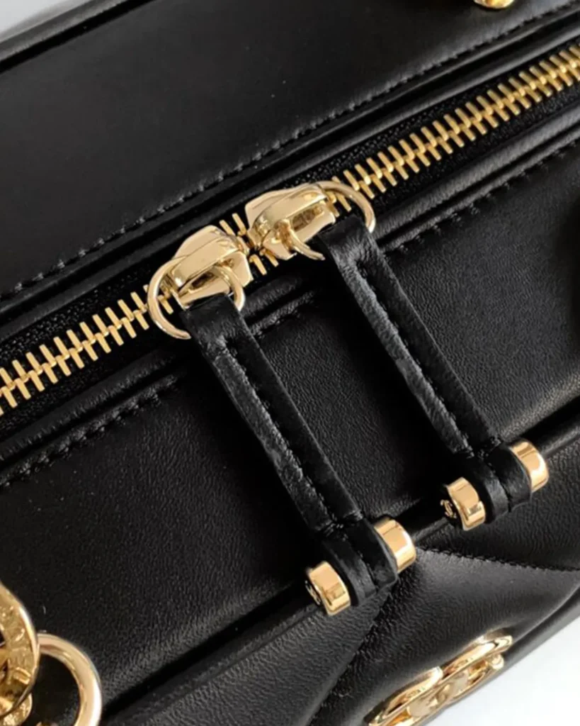 Black Quilted Bowling Bag — zipper detail view