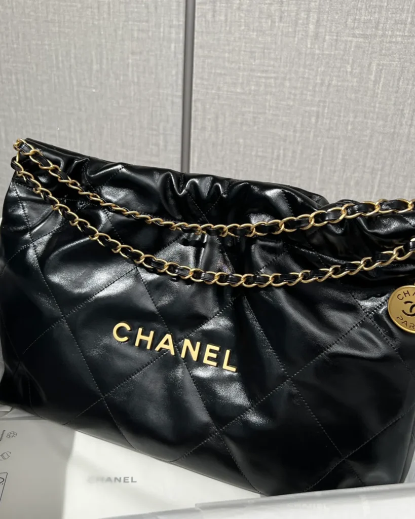 Glossy Black Quilted Chain Shopper — close front view