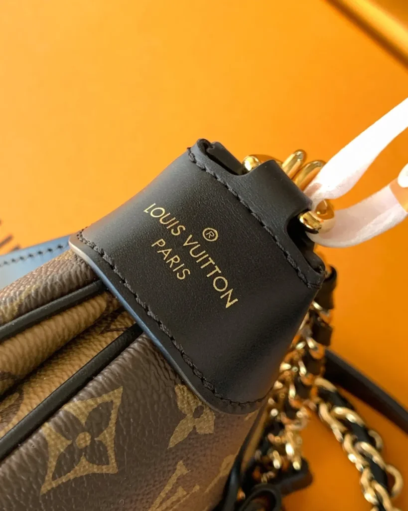 Brown Monogram Curved Shoulder Bag with Chain — strap tab view
