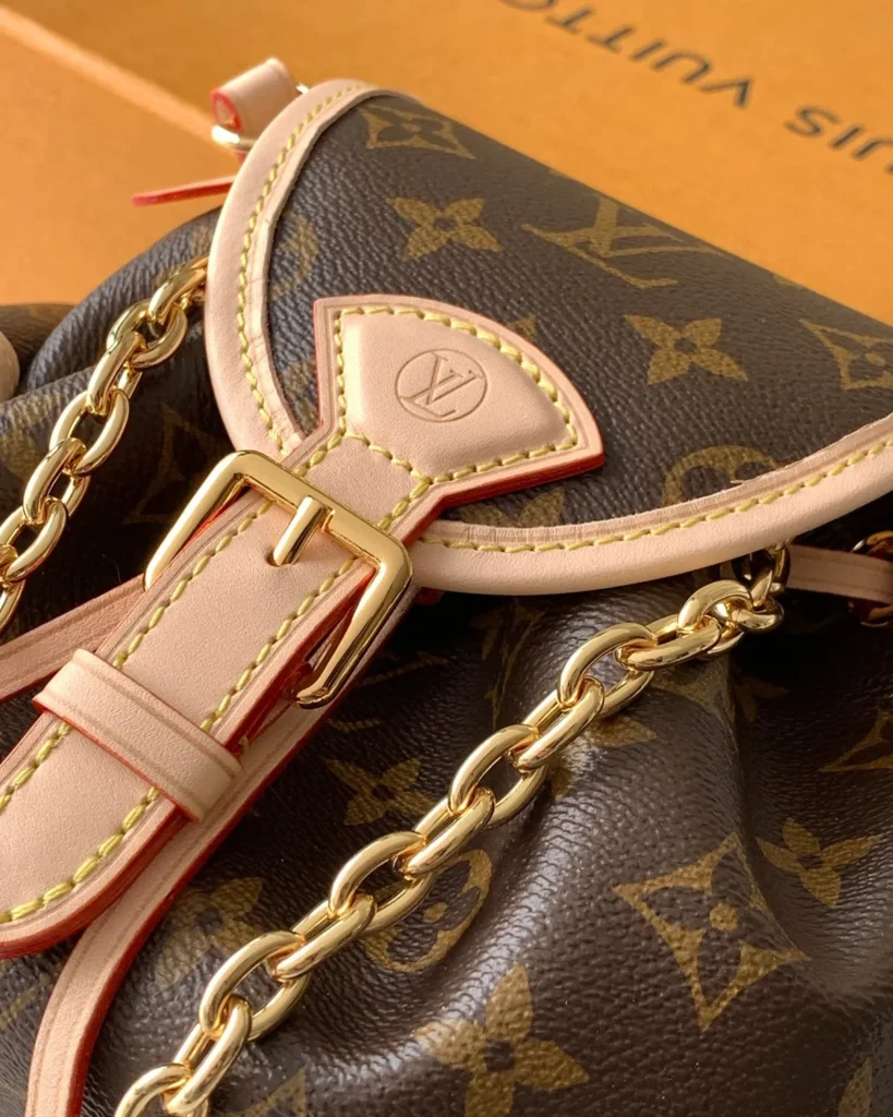 Brown Monogram Buckled Flap Satchel — buckle view