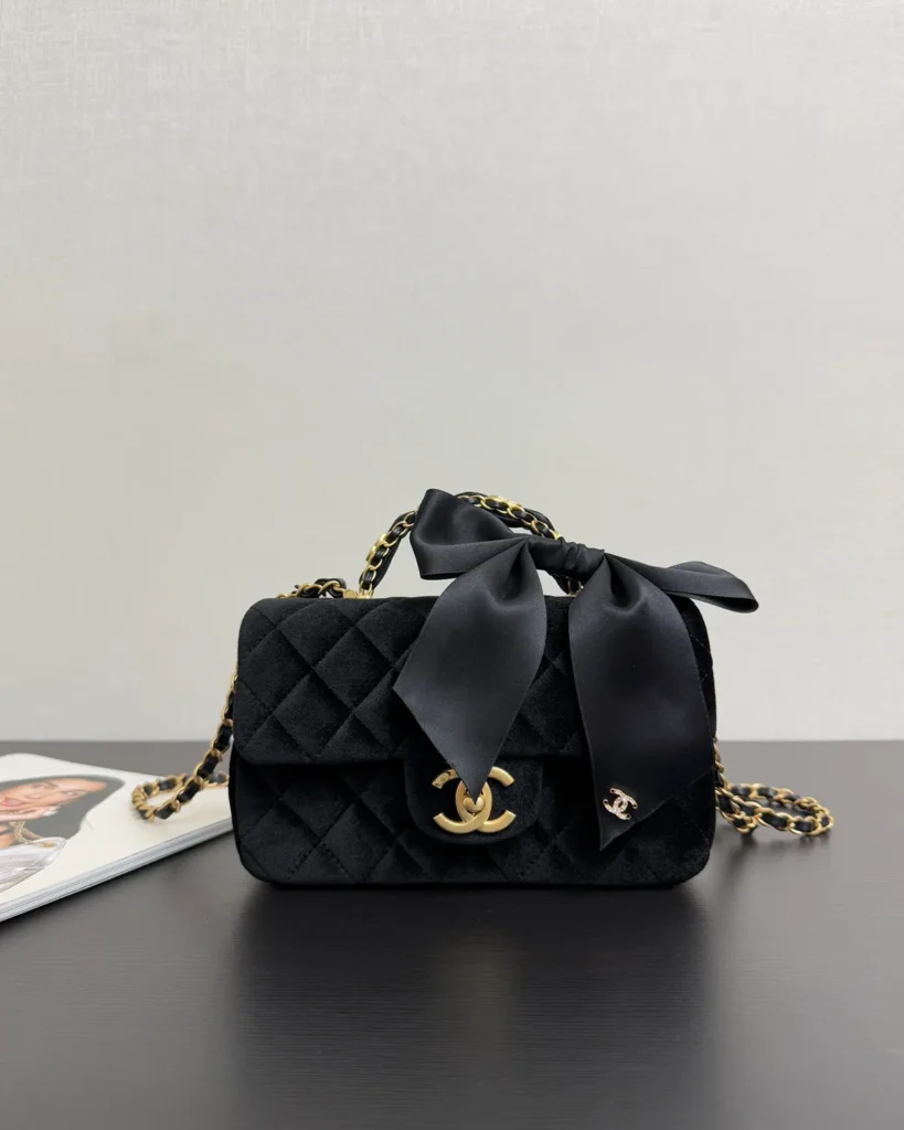 Black Bow-Detail Quilted Top-Handle Bag — front view