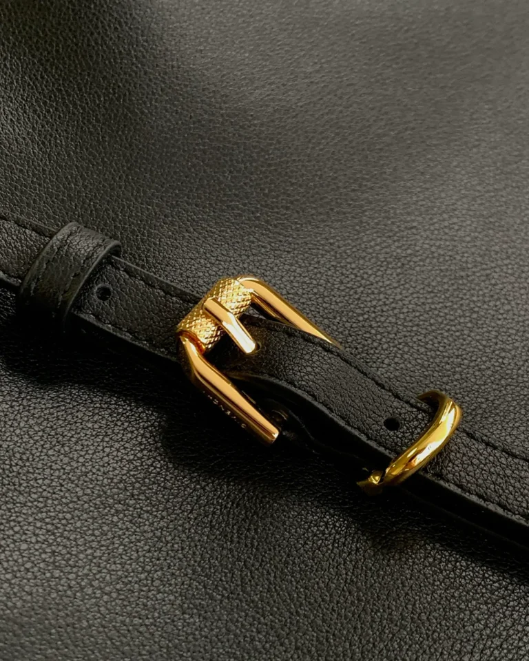Black Curved-Top Buckle Shoulder Bag — buckle detail