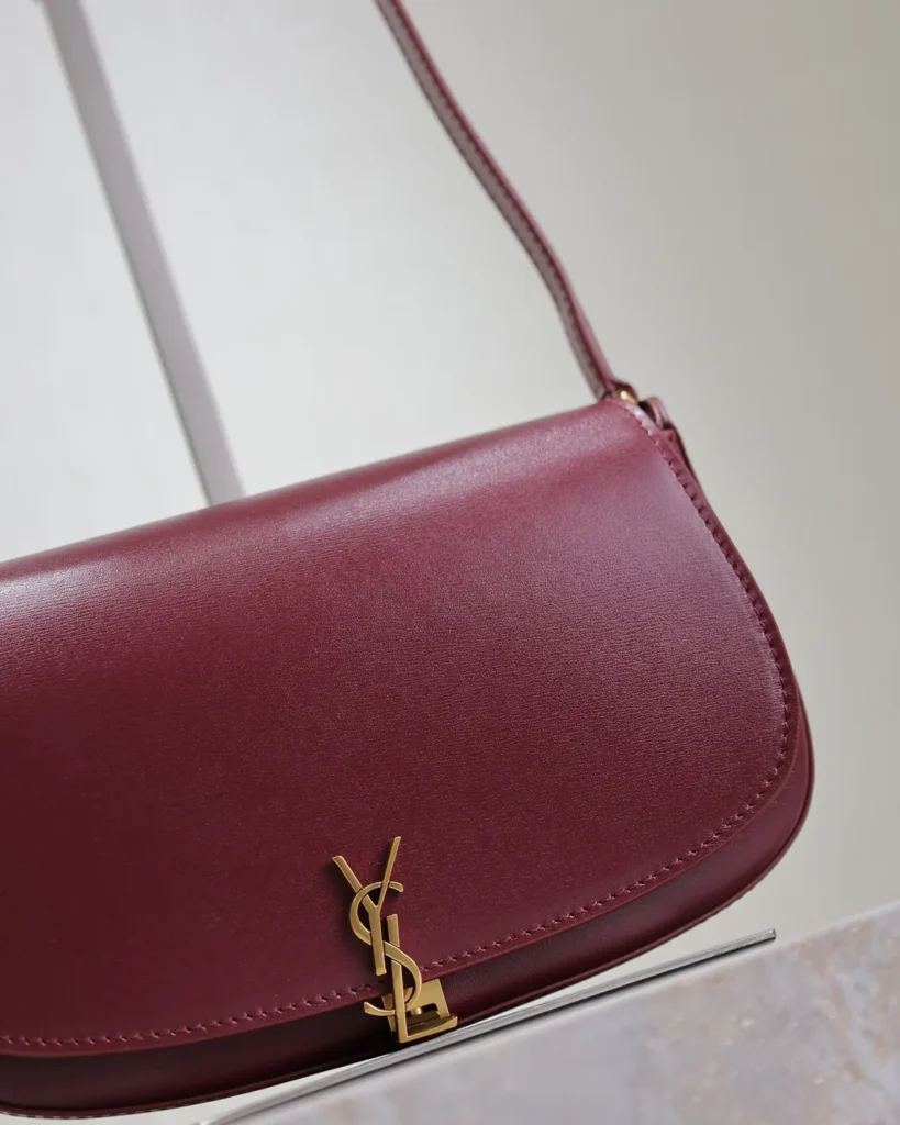 Burgundy Curved-Flap Shoulder Bag — flap detail view