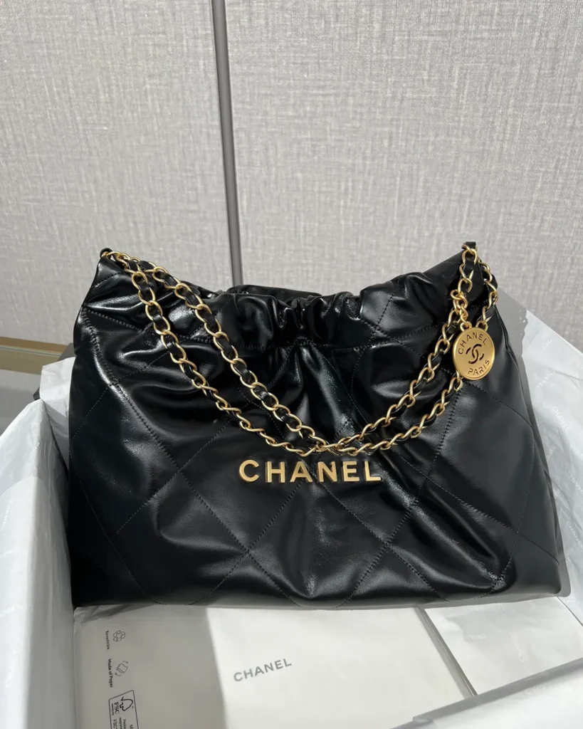 Glossy Black Quilted Chain Shopper — front view