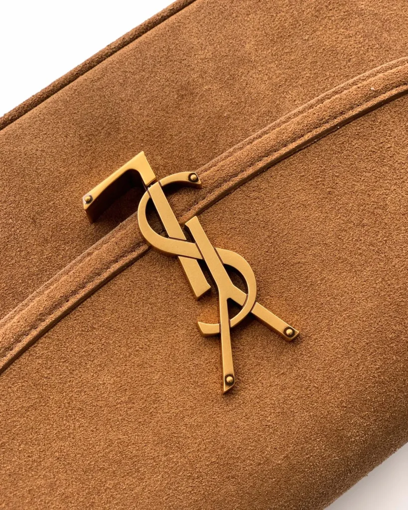 Tan Textured Curved-Flap Shoulder Bag — logo detail view