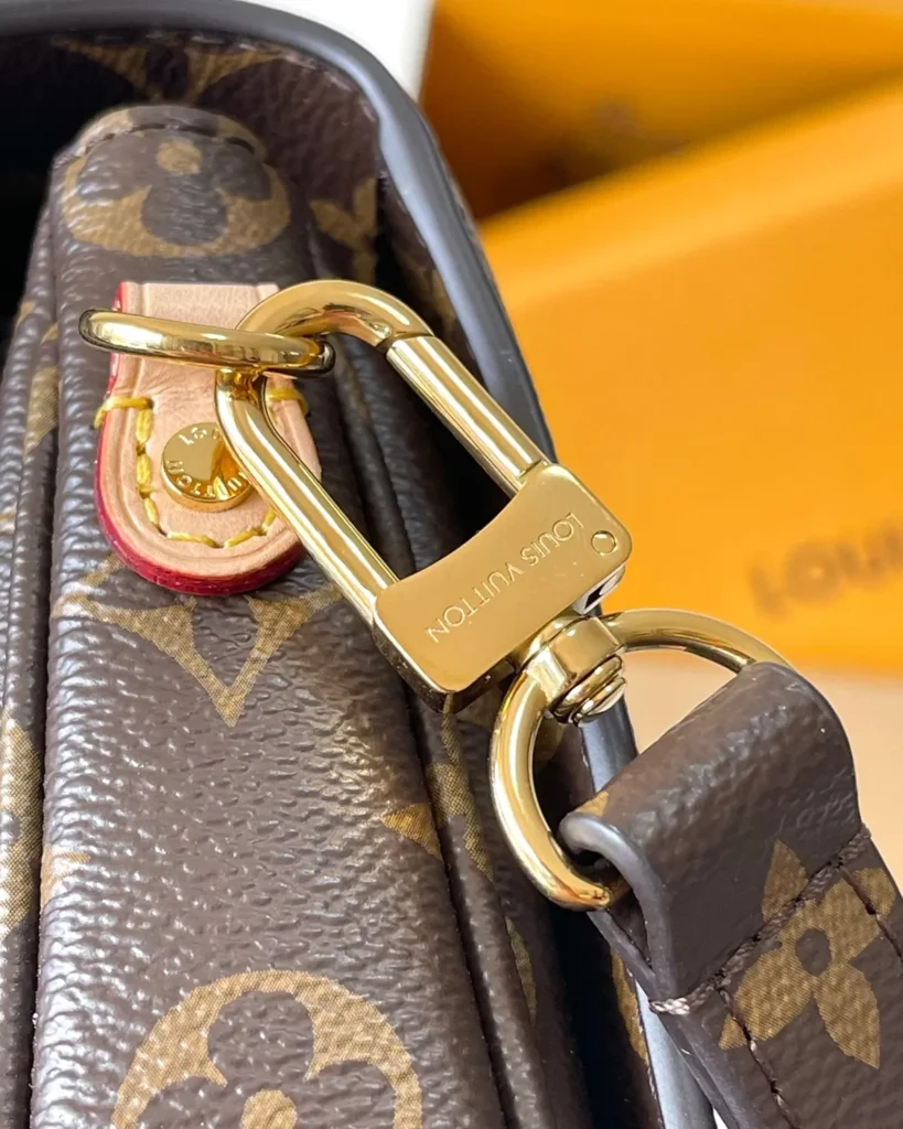 Brown Monogram Flap Satchel — strap clip view