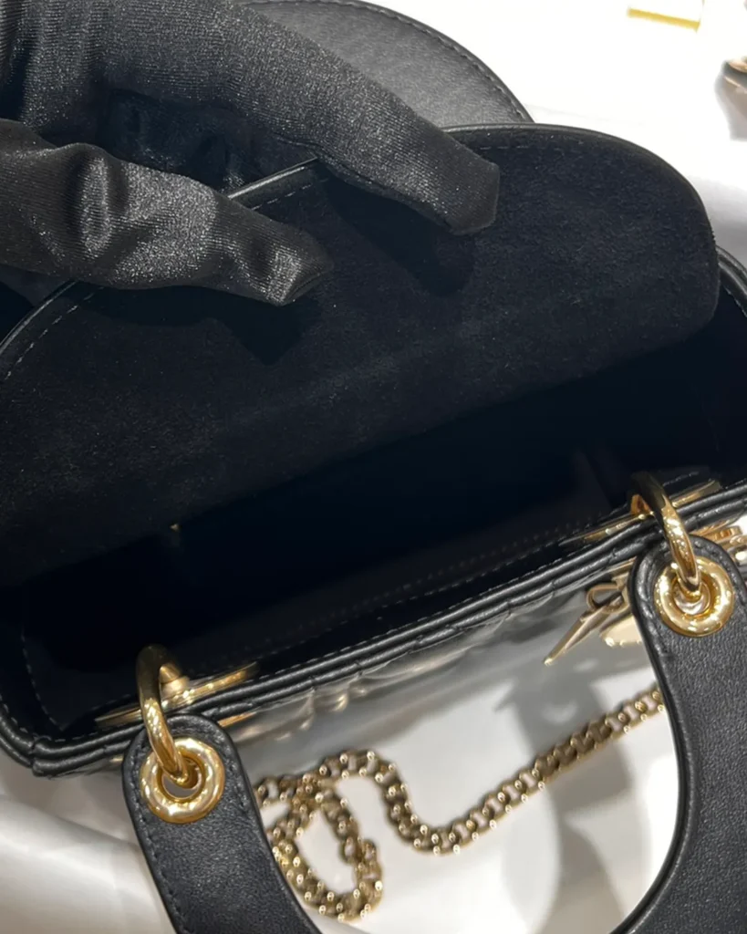 Black Quilted Chain Top Handle Bag — interior view