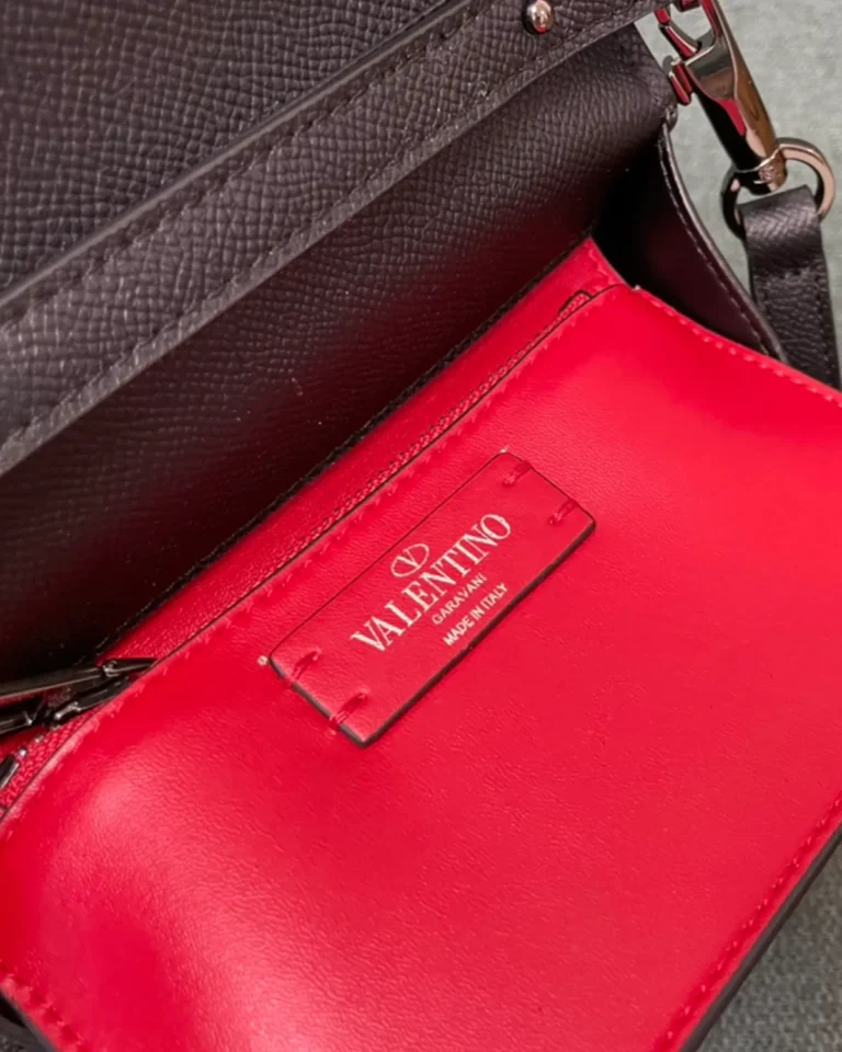 Dark Brown Embellished Emblem Top-Handle Bag — interior label view