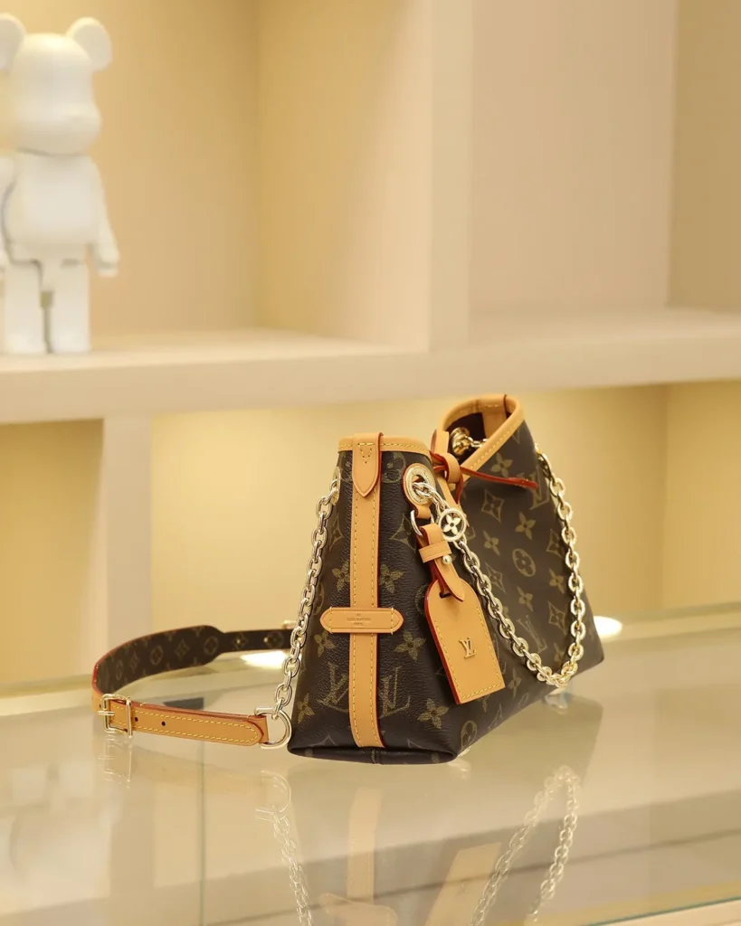 Brown Monogram Bow Chain Shoulder Bag — side view