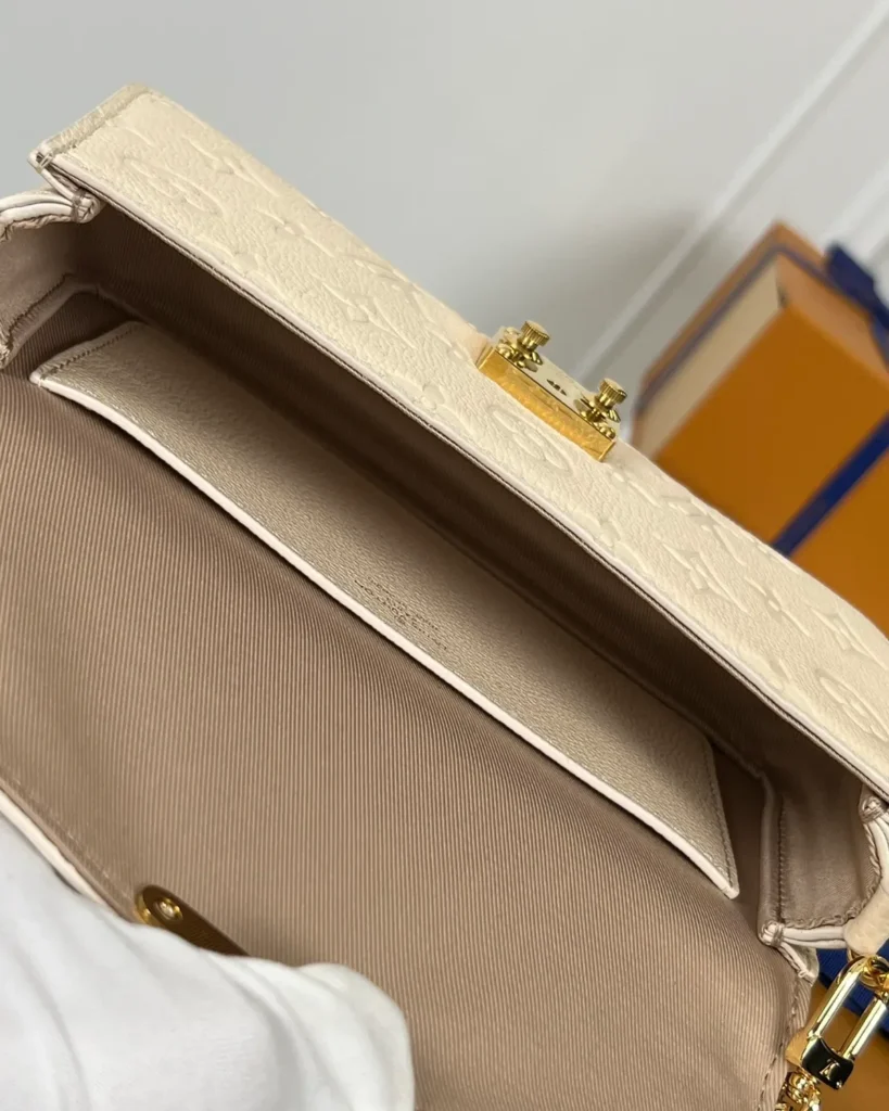 Cream Embossed Flap Chain Wallet — interior view