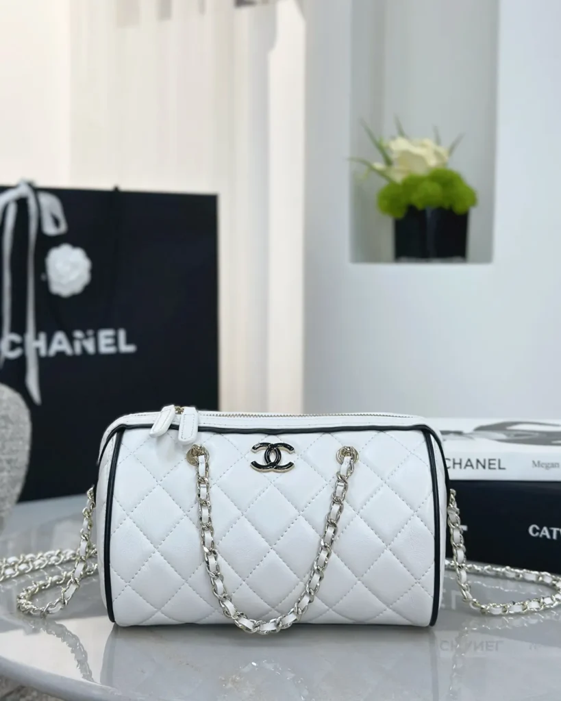 White and Black Quilted Chain Bowler Bag — front view