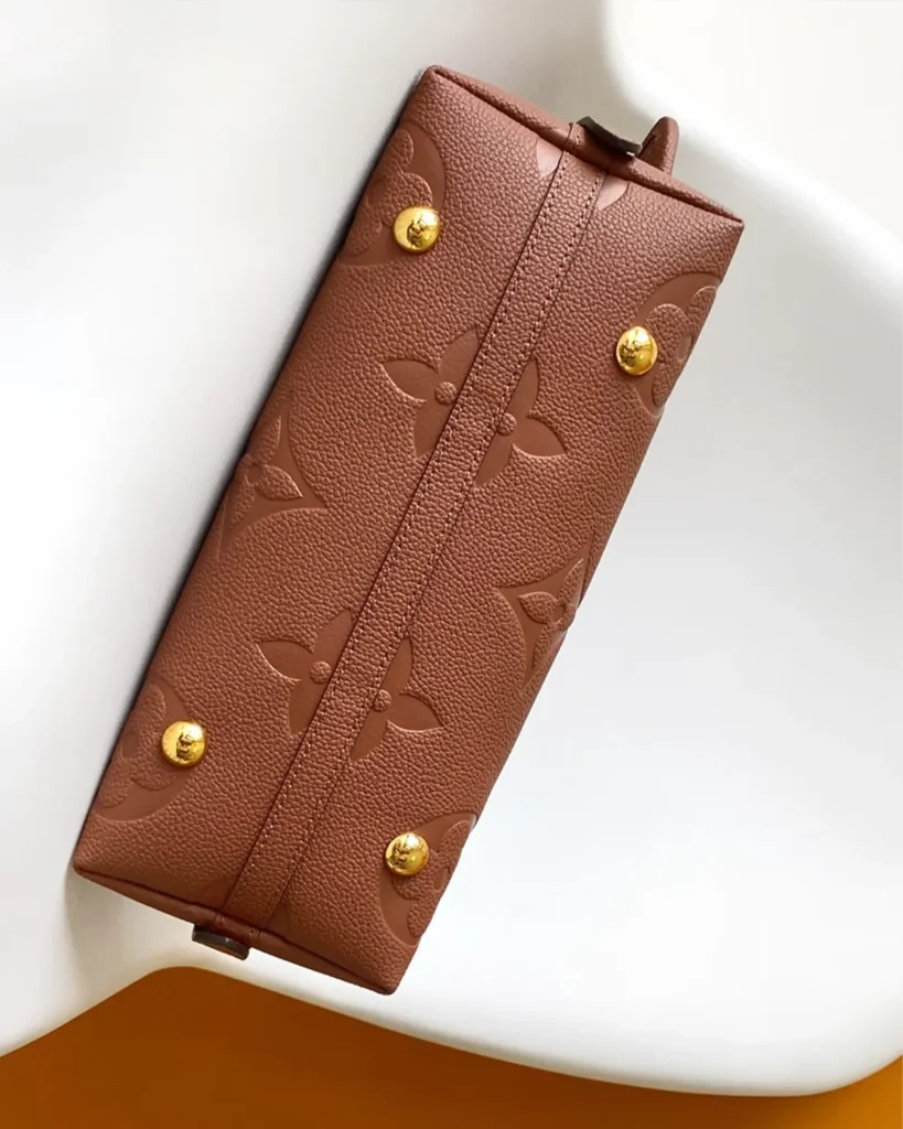 Cognac Embossed Monogram Shoulder Bag — base view