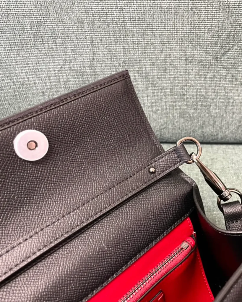Dark Brown Embellished Emblem Top-Handle Bag — flap detail view